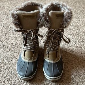 Brand new boots. Too small for me.